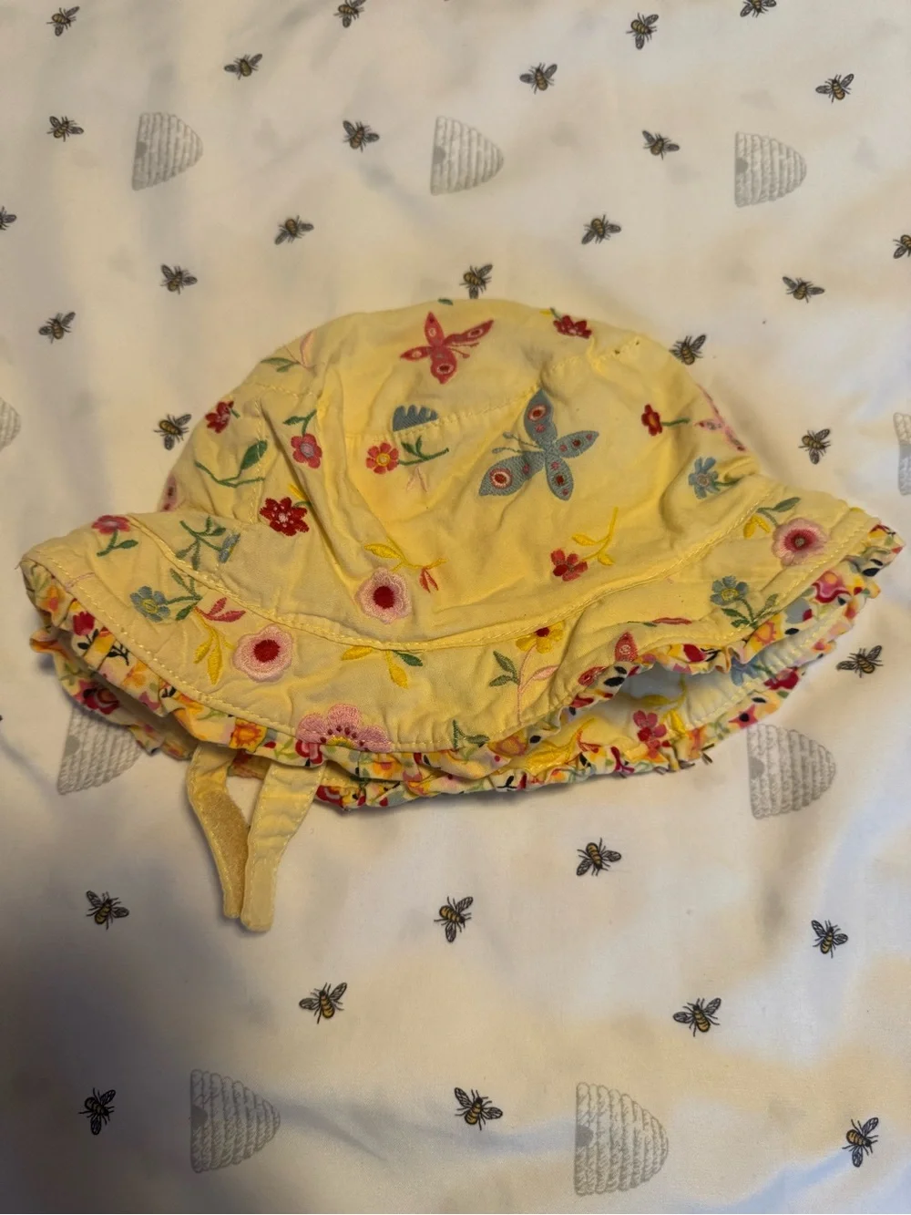 Vintage babyGap Embroidered Floral Ruffle Sun Hat in a size 12–18 months.